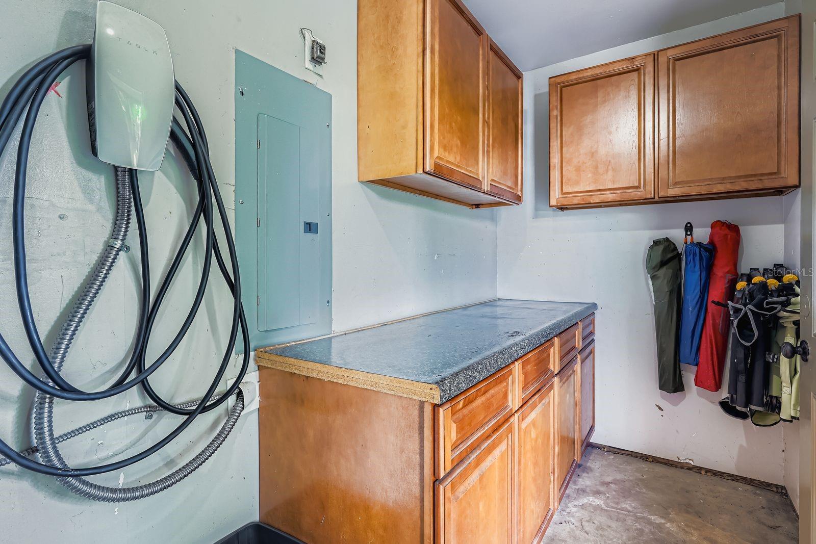 STORAGE PART OF LAUNDRY ROOM W/ EVERYONE CHARGER