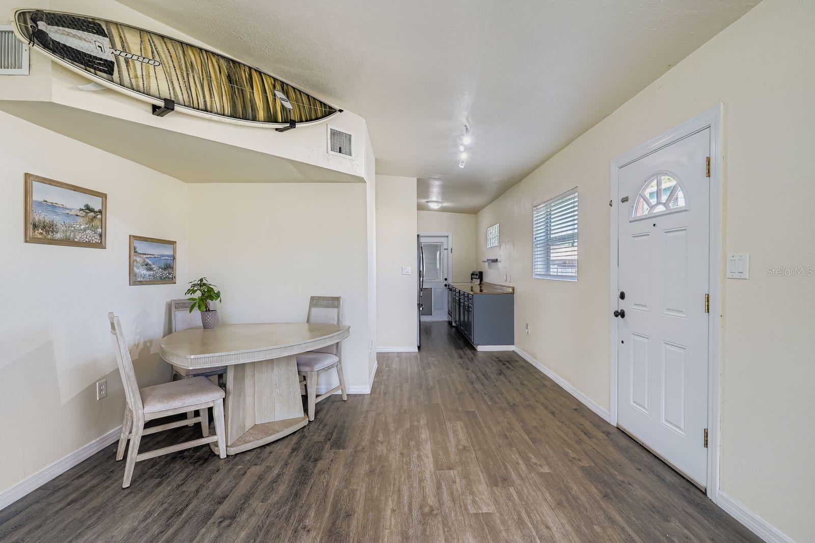 DR TO KITCHEN VIEW INCLUDES ENTRY DOOR