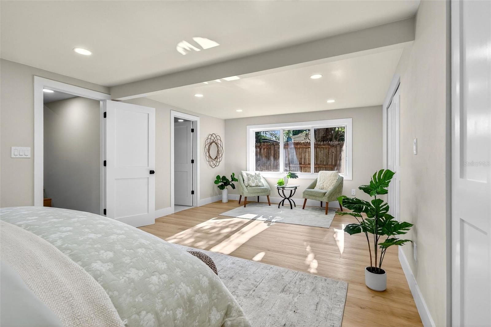 Primary Bedroom with Ensuite Bathroom and Dual Closets