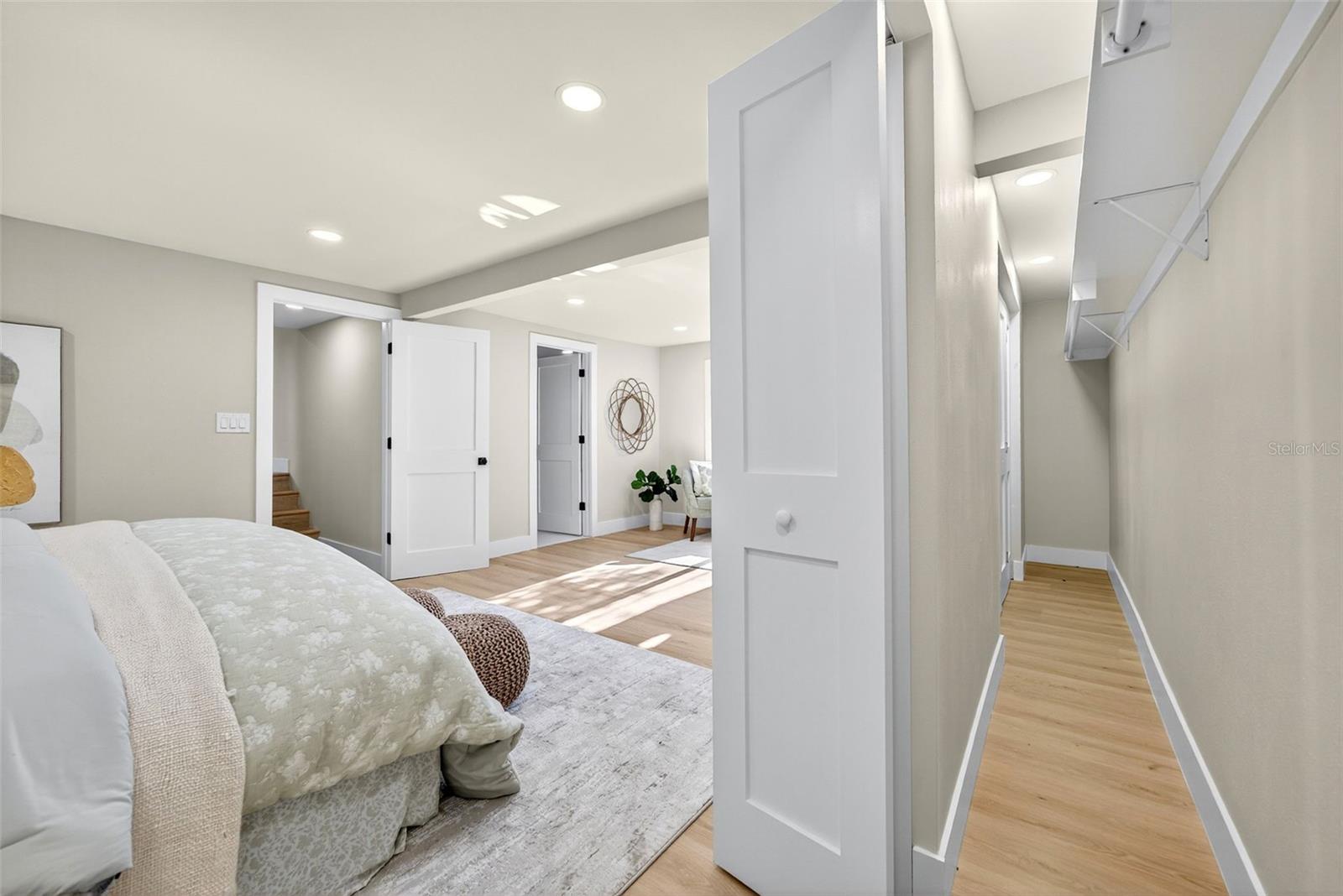 Primary Bedroom with Ensuite Bathroom and Dual Closets