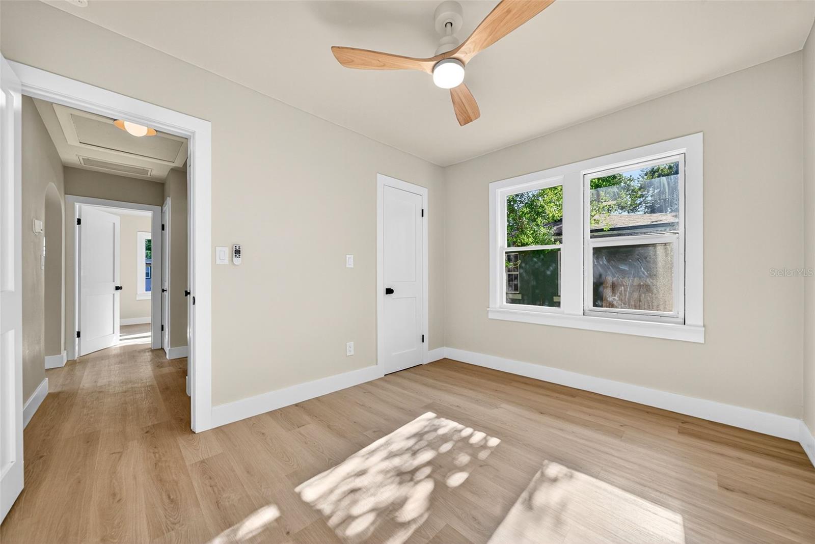 Additional front/2nd bedroom with shared hallway bath.
