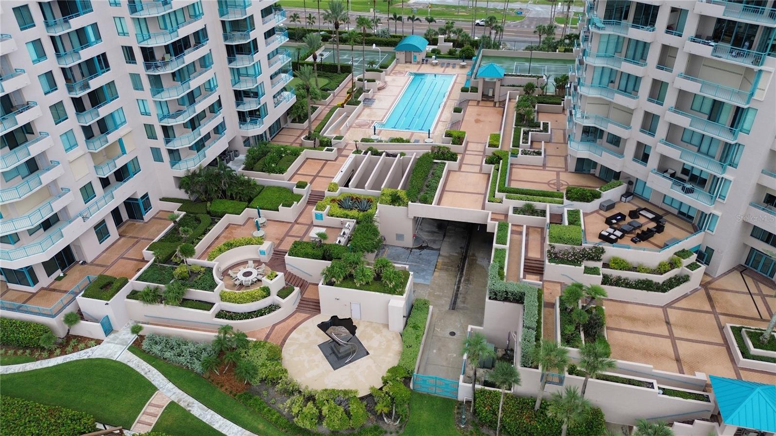 The 2nd pool is a lap pool.  Also shown here are the fire pit, and BBQ area with 3 BBQs!