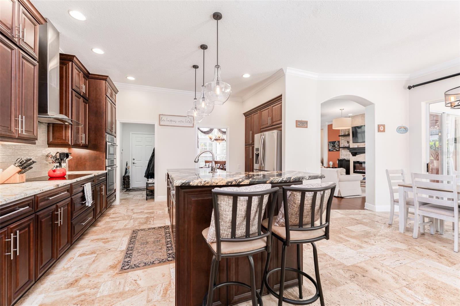 Center Island with Sink, Dishwasher, Wine Fridge, and Seating