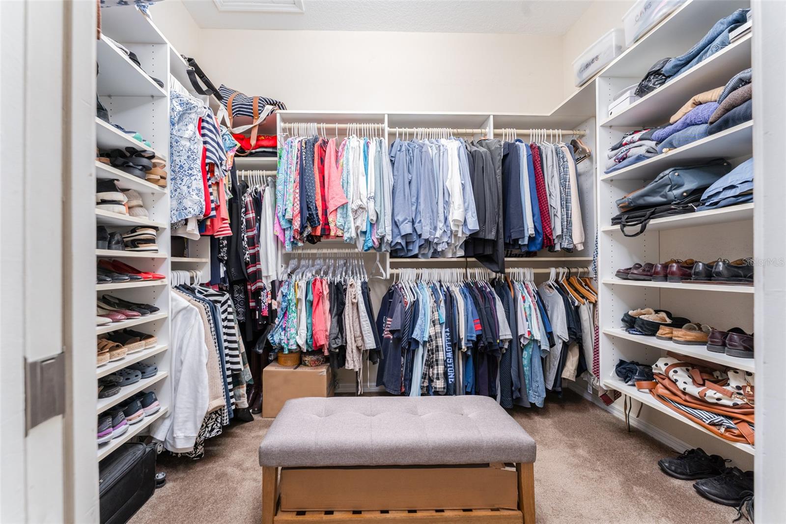 Spacious Primary Walk in Closet with Built in Organizers
