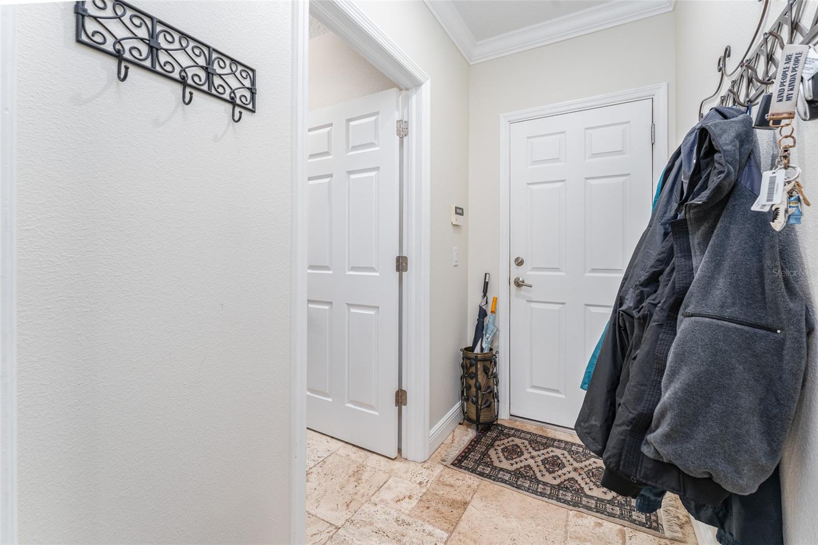 Drop Area Leads to Laundry Room & Garage
