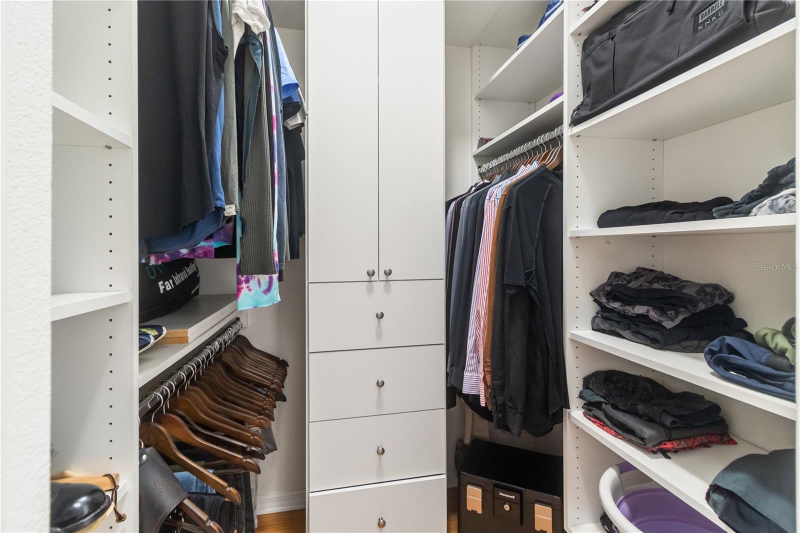 Second primary walk-in closet with built in shelving