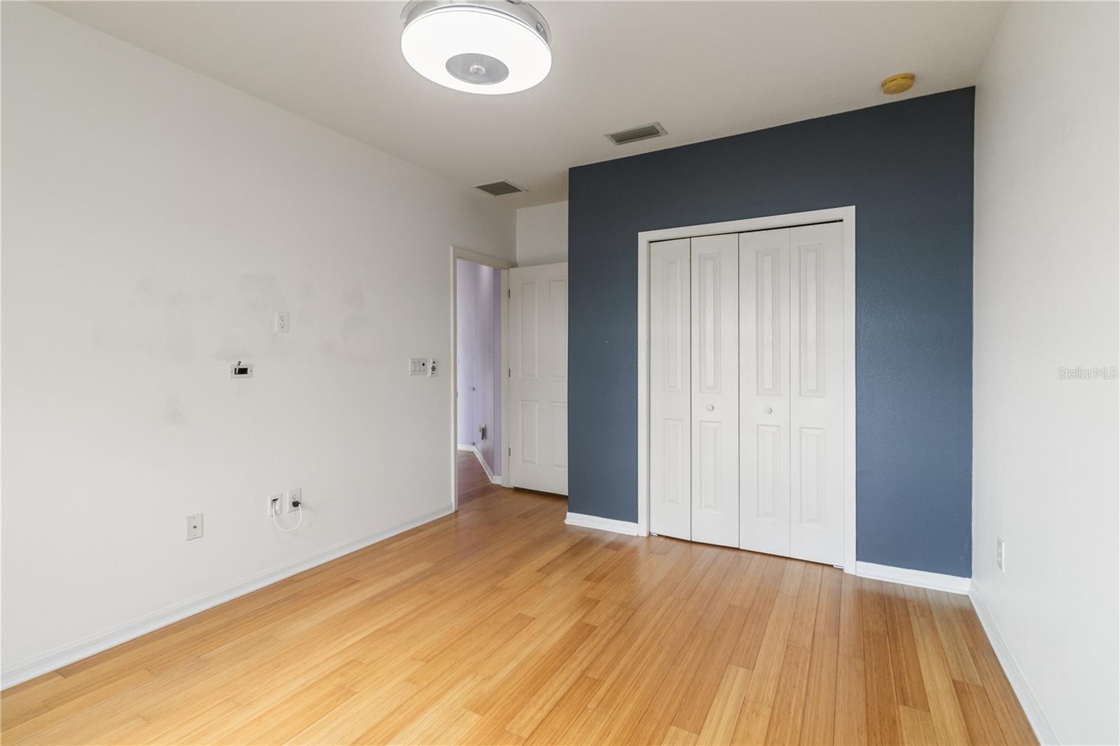 bedroom 4 with chandelier fan
