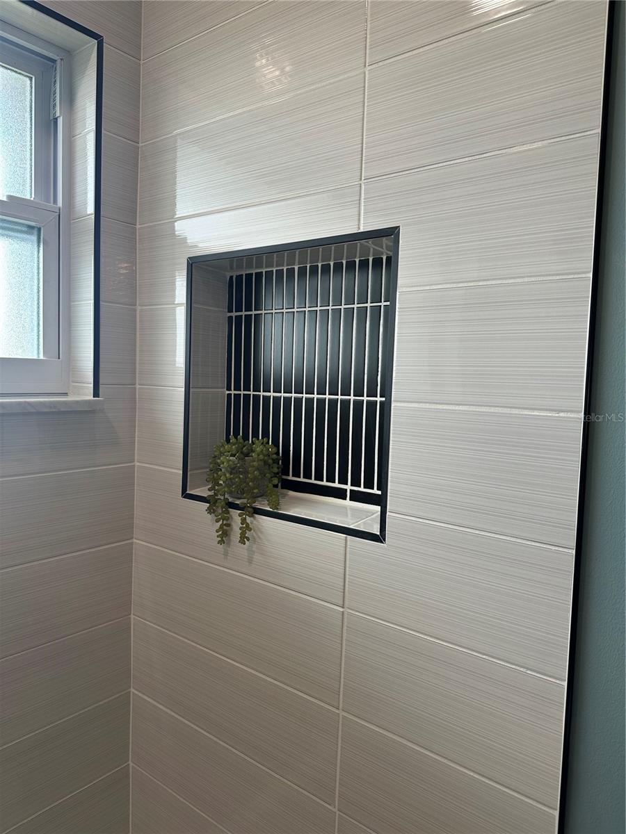 Primary step-in shower.