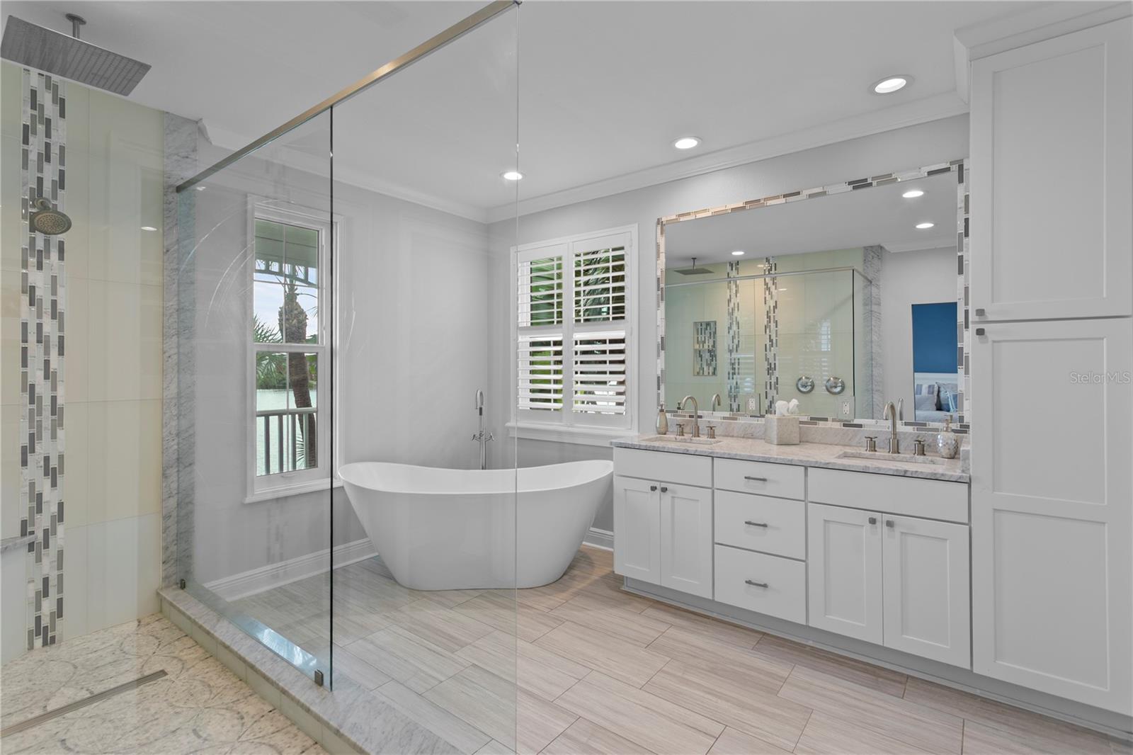 A spa like retreat awaits with oversized walk in shower