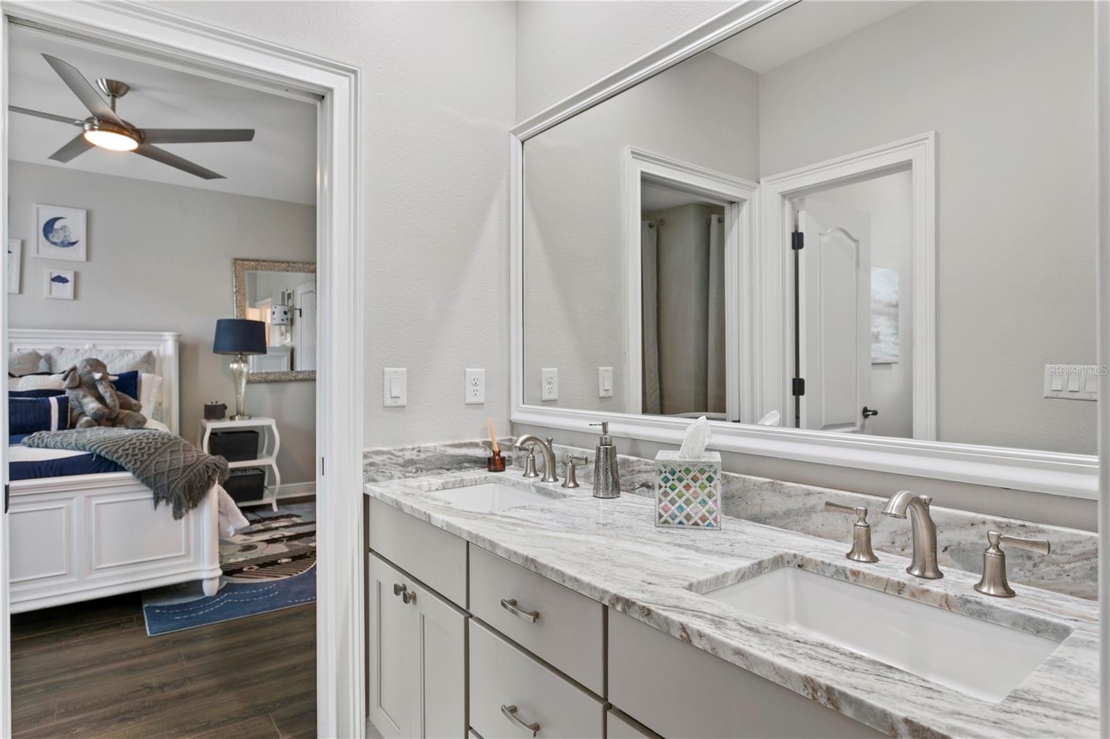 Bath #2; fully renovated with dual sinks and separate tub/shower area