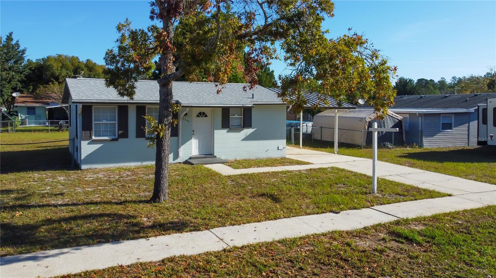 2. Shade Tree in Front Yard. Low Maintenance Lawn Care!
