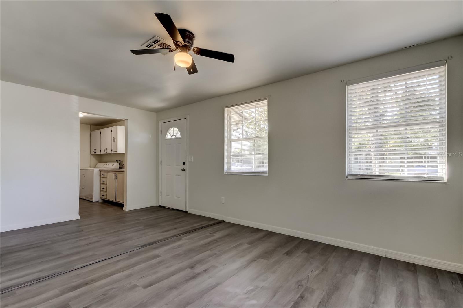 15. Natural Light Beams in from the Front Windows of the Home. Great Room (17.6' x 11.3').