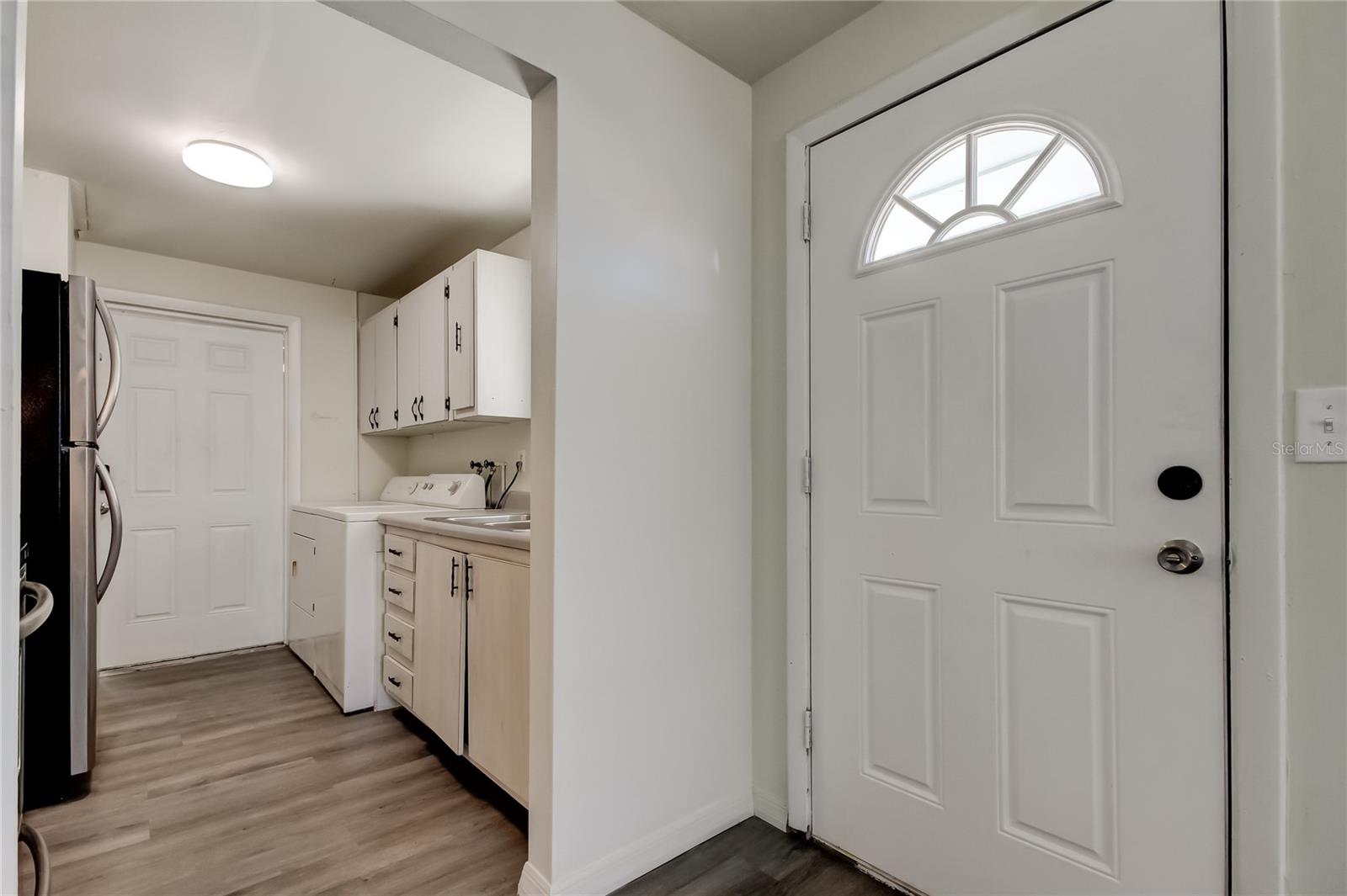 16. Kitchen (11' x 7.9')  is Just off the Living Room.