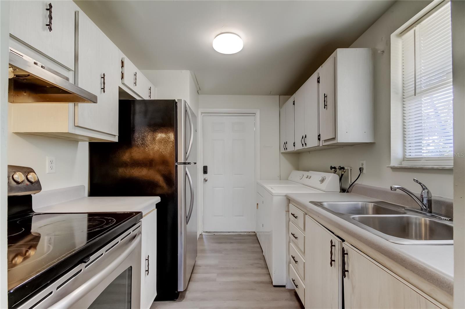 17. Dual Entry Galley Style Kitchen is Spacious for a 660sf Home! It'll Surprise YOU! (11' x 7.9')