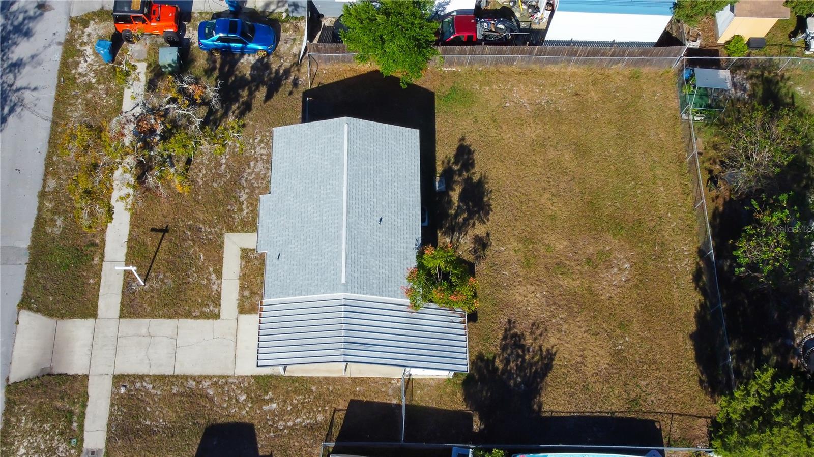 4. Very Large, FENCED IN, Backyard for Fido, Kids, a Pool, or Build Onto the Home to Make it Yours!!