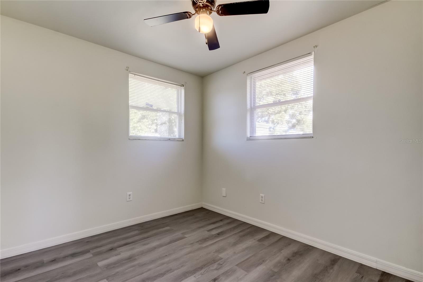 32. Bedroom 2 (8.9' x 9.10'). Ceiling Fans are in Each of the Bedrooms!