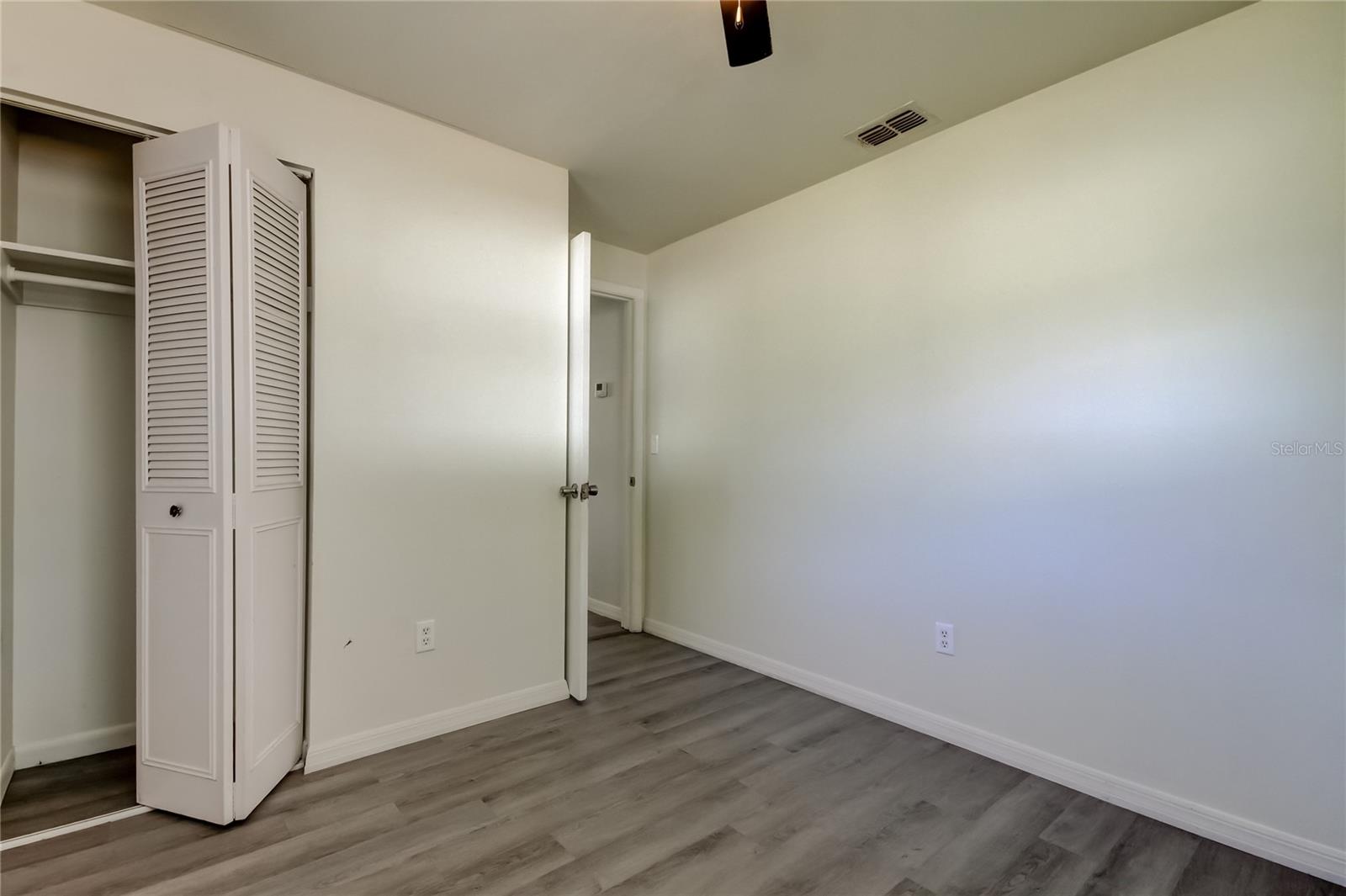 34. Bedroom 2 (8.9' x 9.10'). Built-In Closet with Plenty of Storage Room.