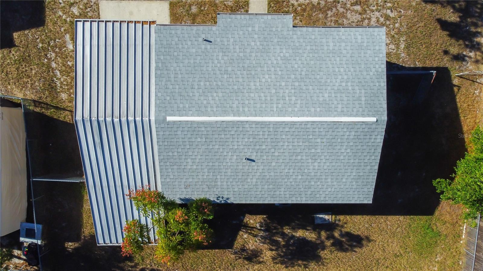 6. ROOF Just Updated in 2022! Aluminum Roof Over Carport (330sf) will Last a Very Long Time!!