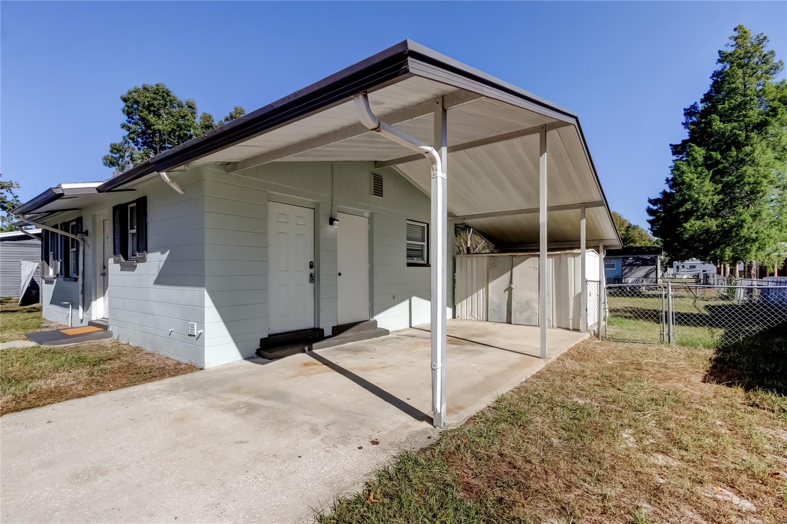 8. Spacious Carport (330sf) Keeps Your Car in the Shade & Out of the Rain! Large Storage Shed (7.5' x 10') too!