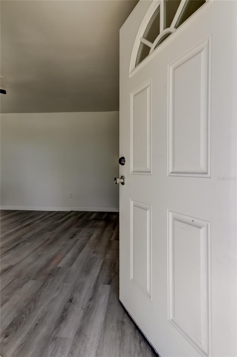 9. Welcome to YOUR New Home.. Beautiful Driftwood Grey Luxury Vinyl Laminate Flooring Throughout!!