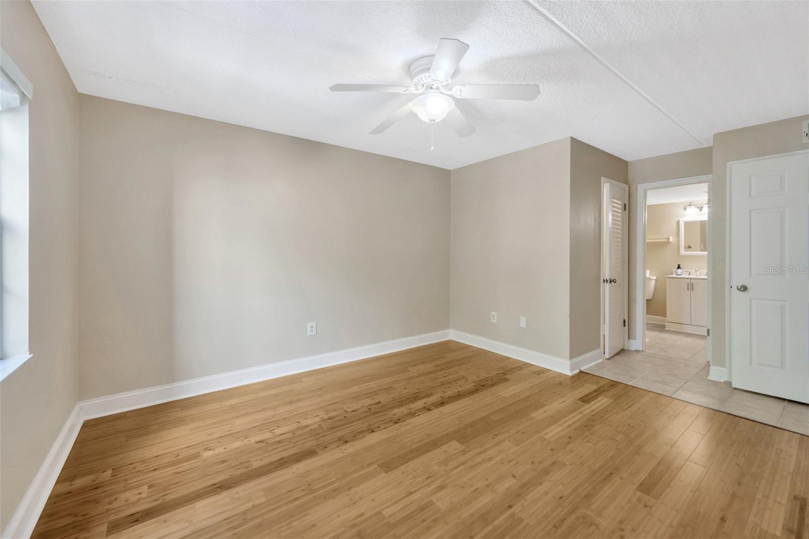 View of closets and bathroom