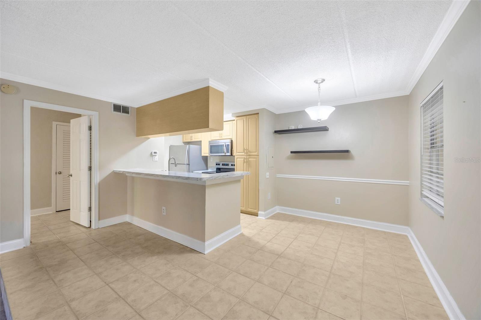 Dining space and kitchen