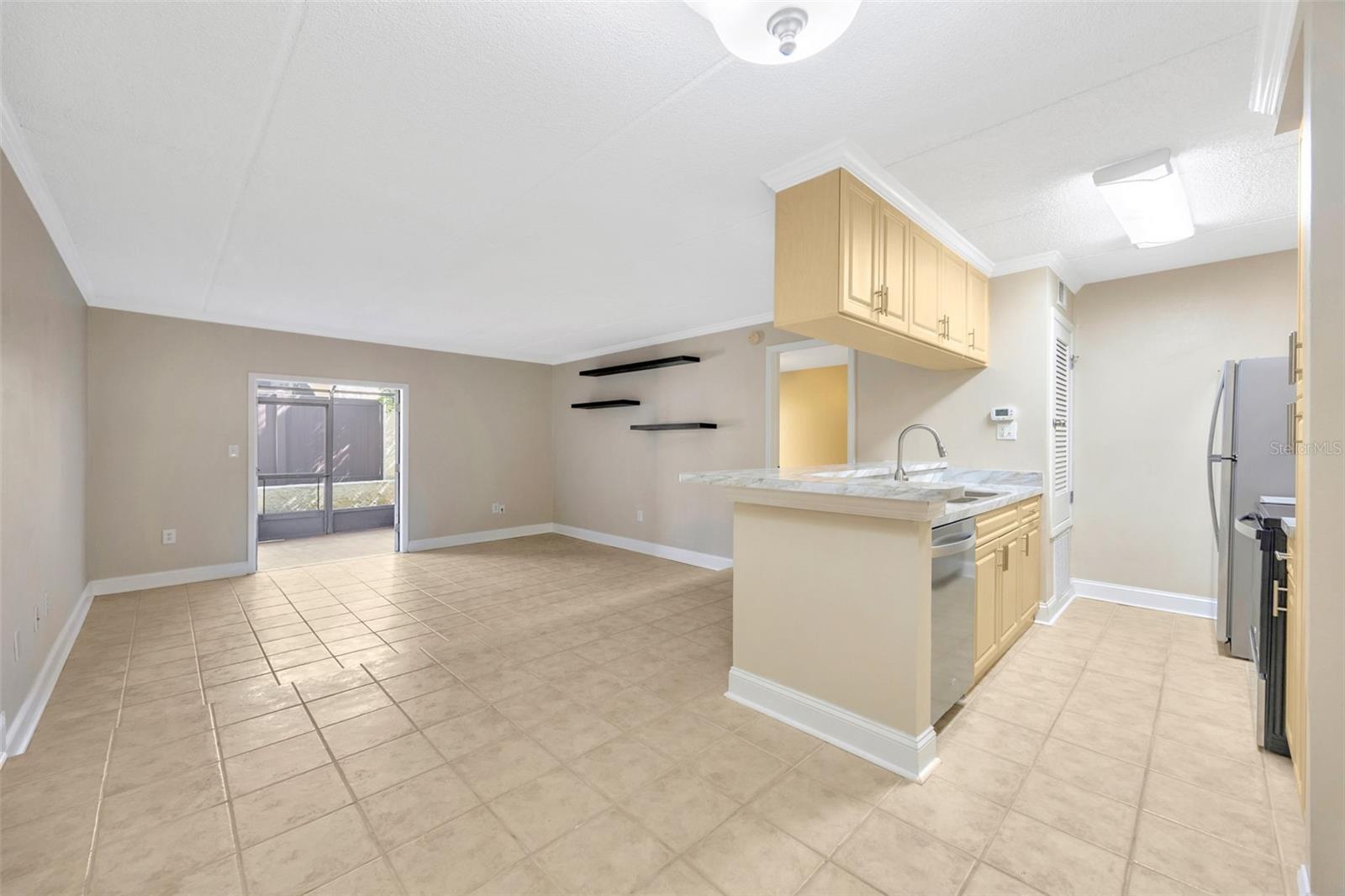 Living room and kitchen from dining