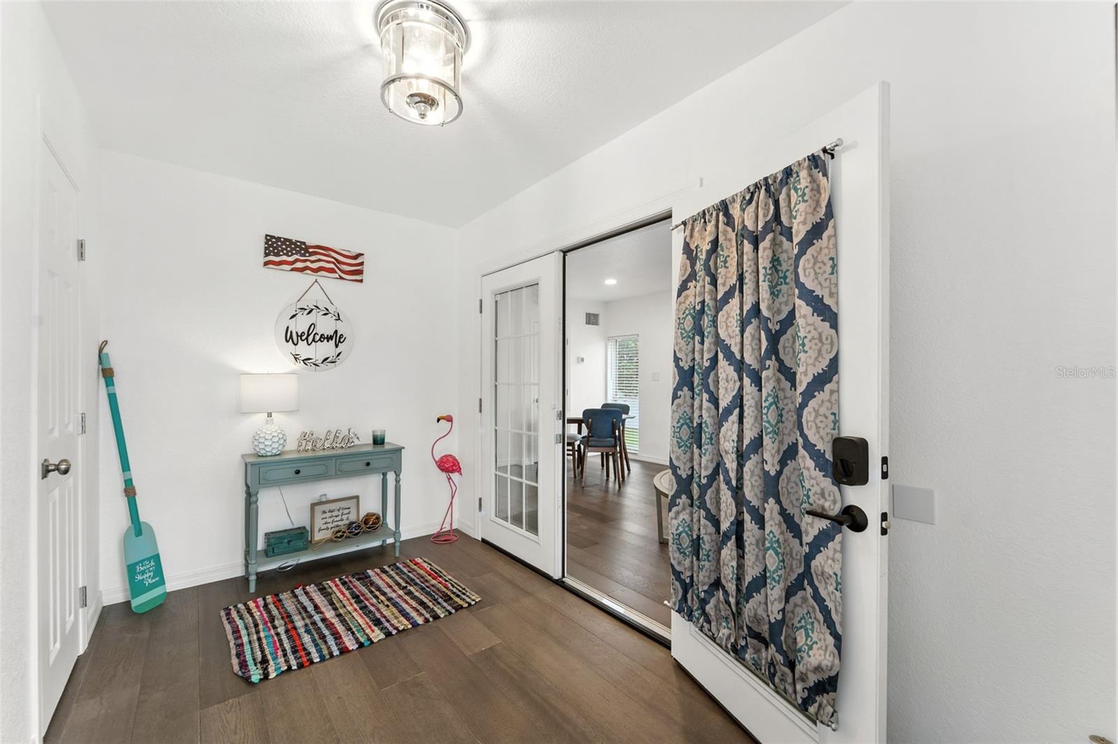 Foyer Entrance with 2 private entrances and a storage closet. Could be made into a 2nd downstairs bedroom if desired.