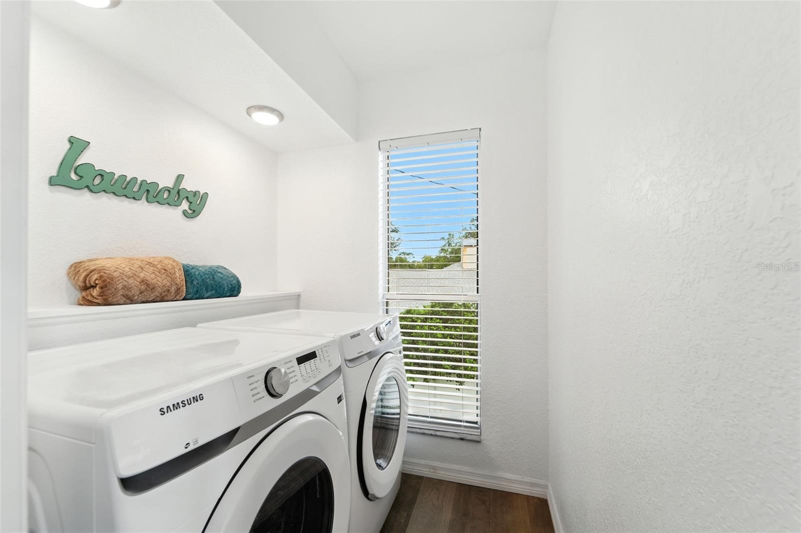 Laundry room overlooking your backyard.