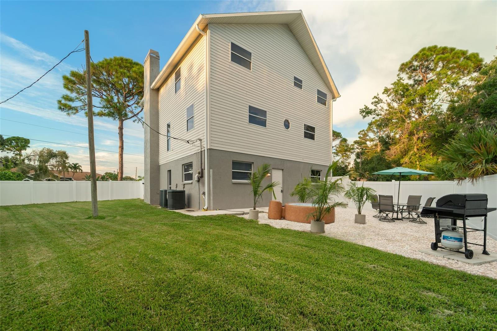 Large Saint Augustine Grass Area in backyard for all activities.