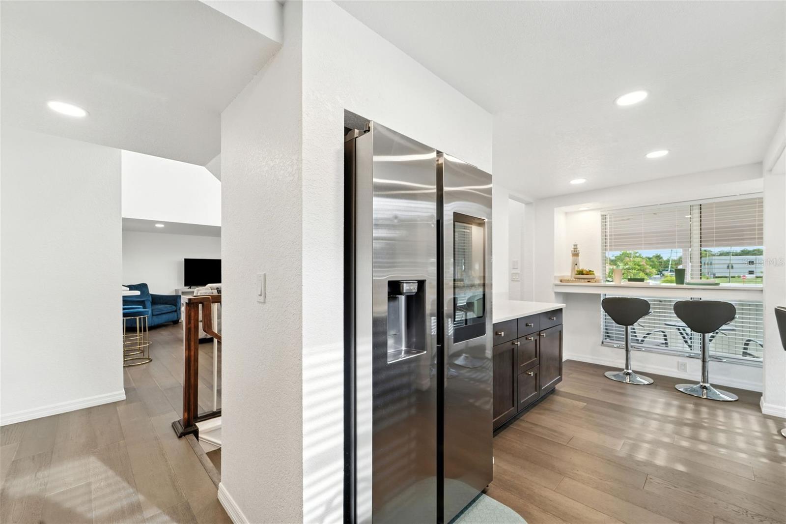 Large Kitchen with eat-in bar and coffer/breakfast nook.