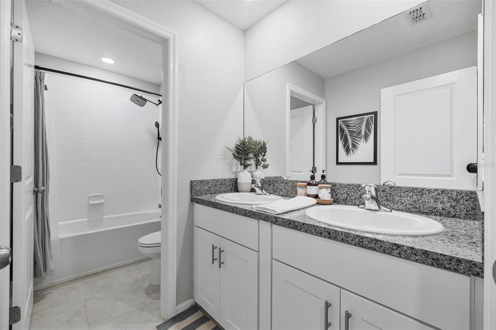 Guest Bathroom with Double Sinks!