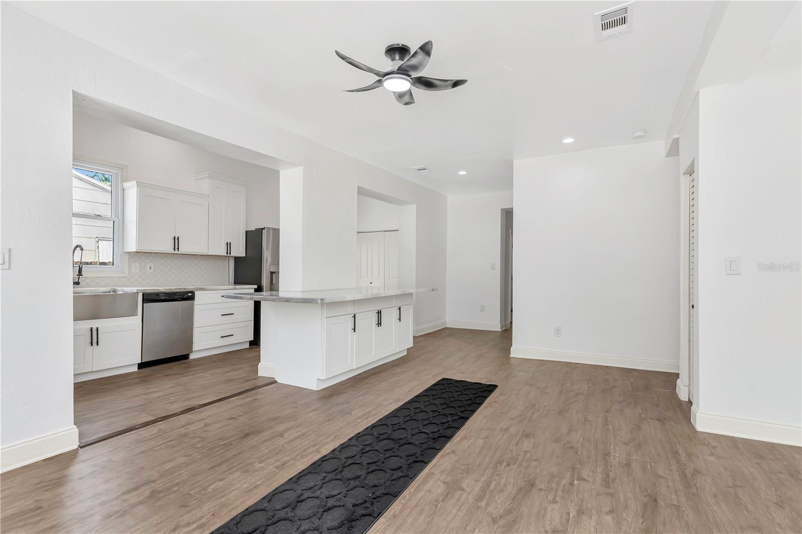 Living area showing kitchen