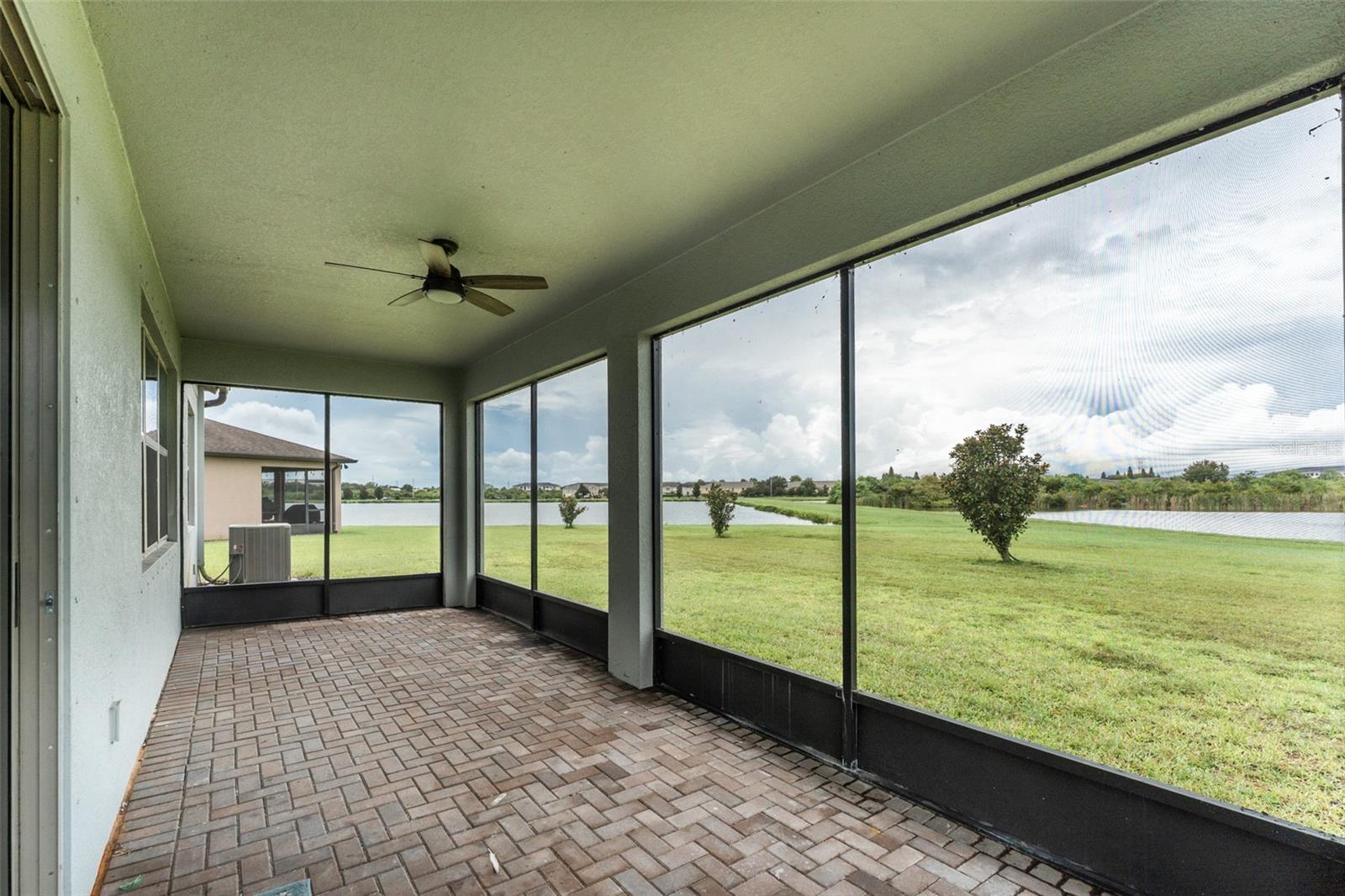 Covered and screened back porch, perfect for nature watching!