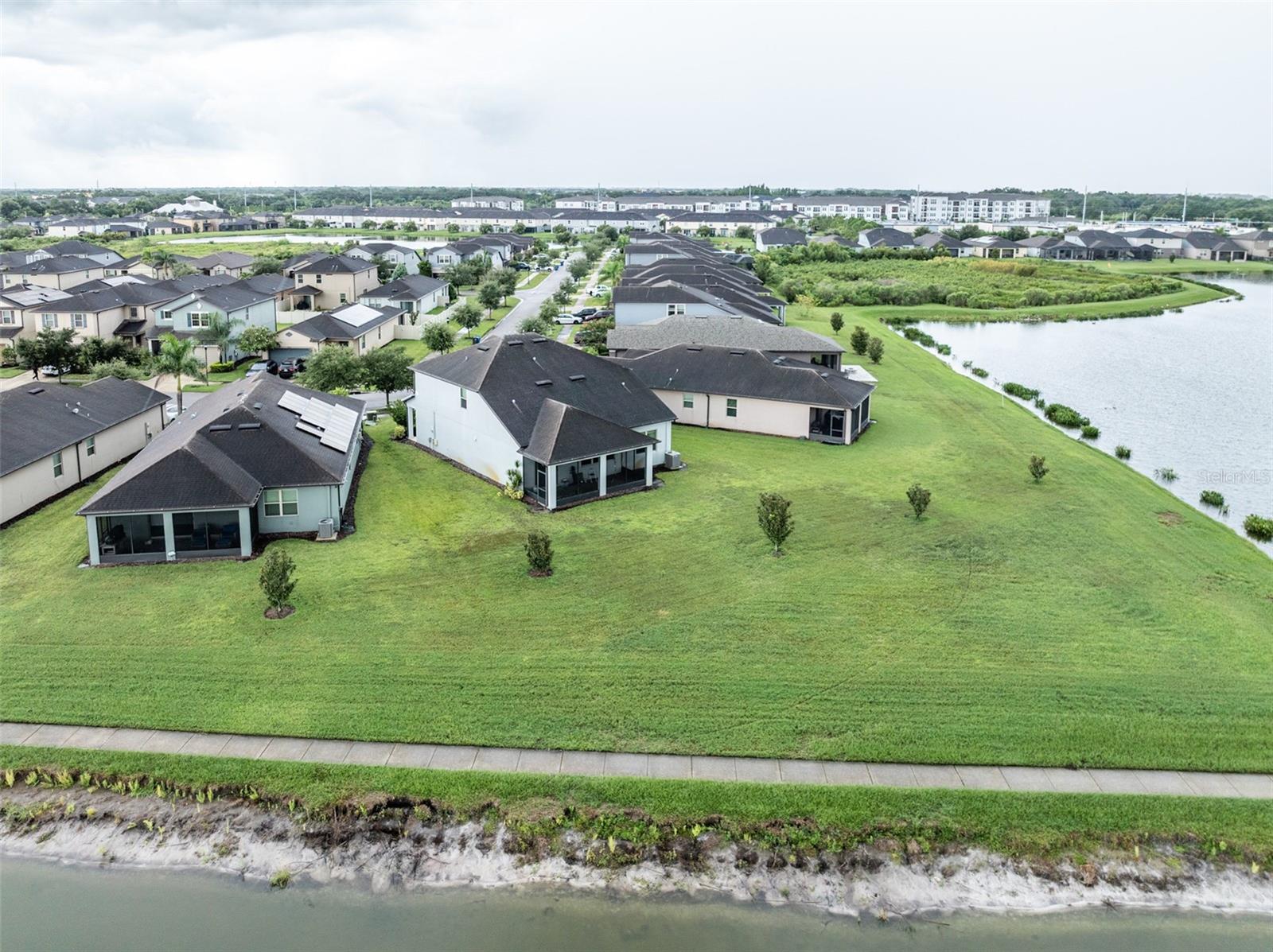 Can you picture yourself having this huge, private back yard?
