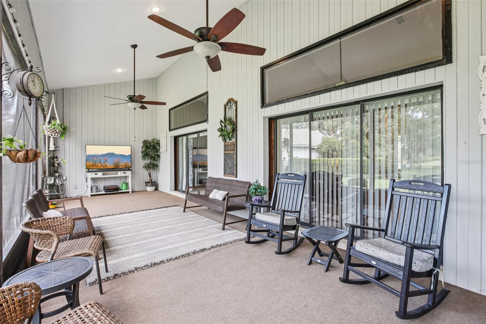 Spacious Lanai with open sliders to primary bedroom, living room and kitchen