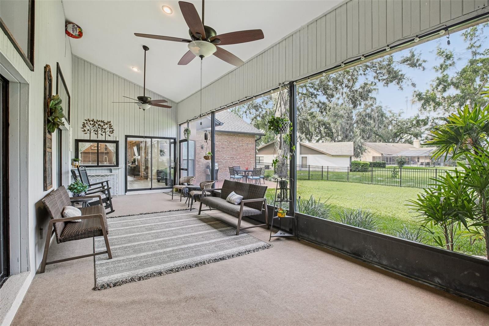 Spacious Lanai with open sliders to primary bedroom, living room and kitchen