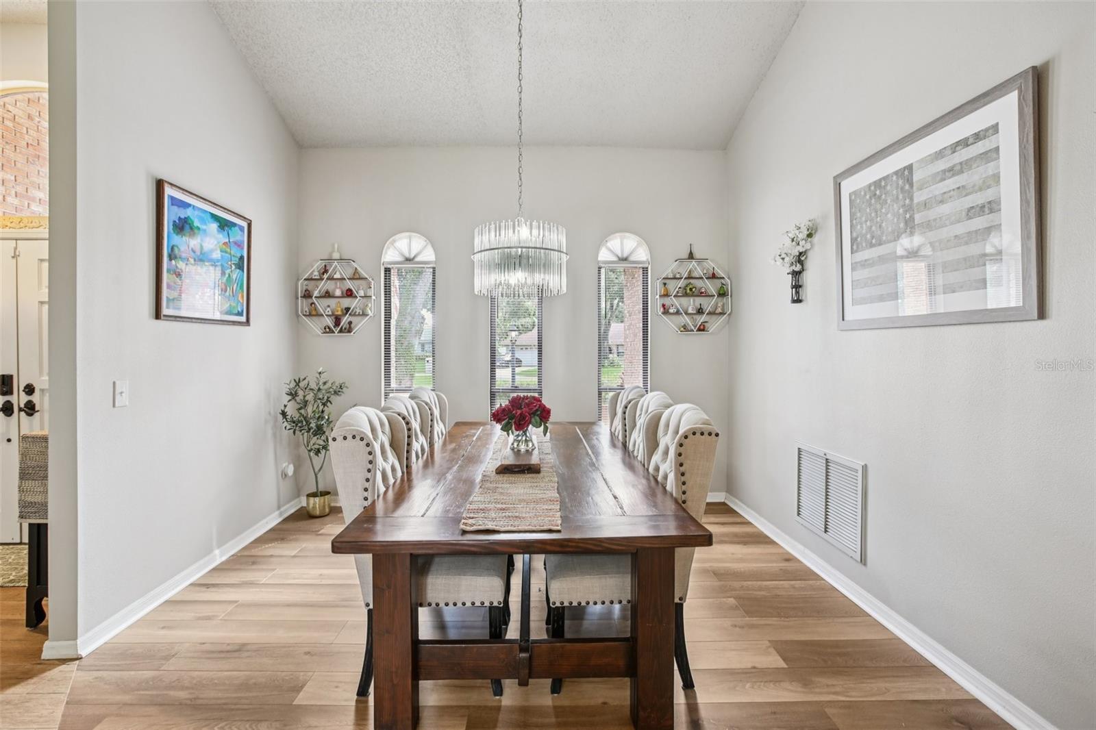 Dining Room off the kitchen with beautiful luxury vinyl plank floors