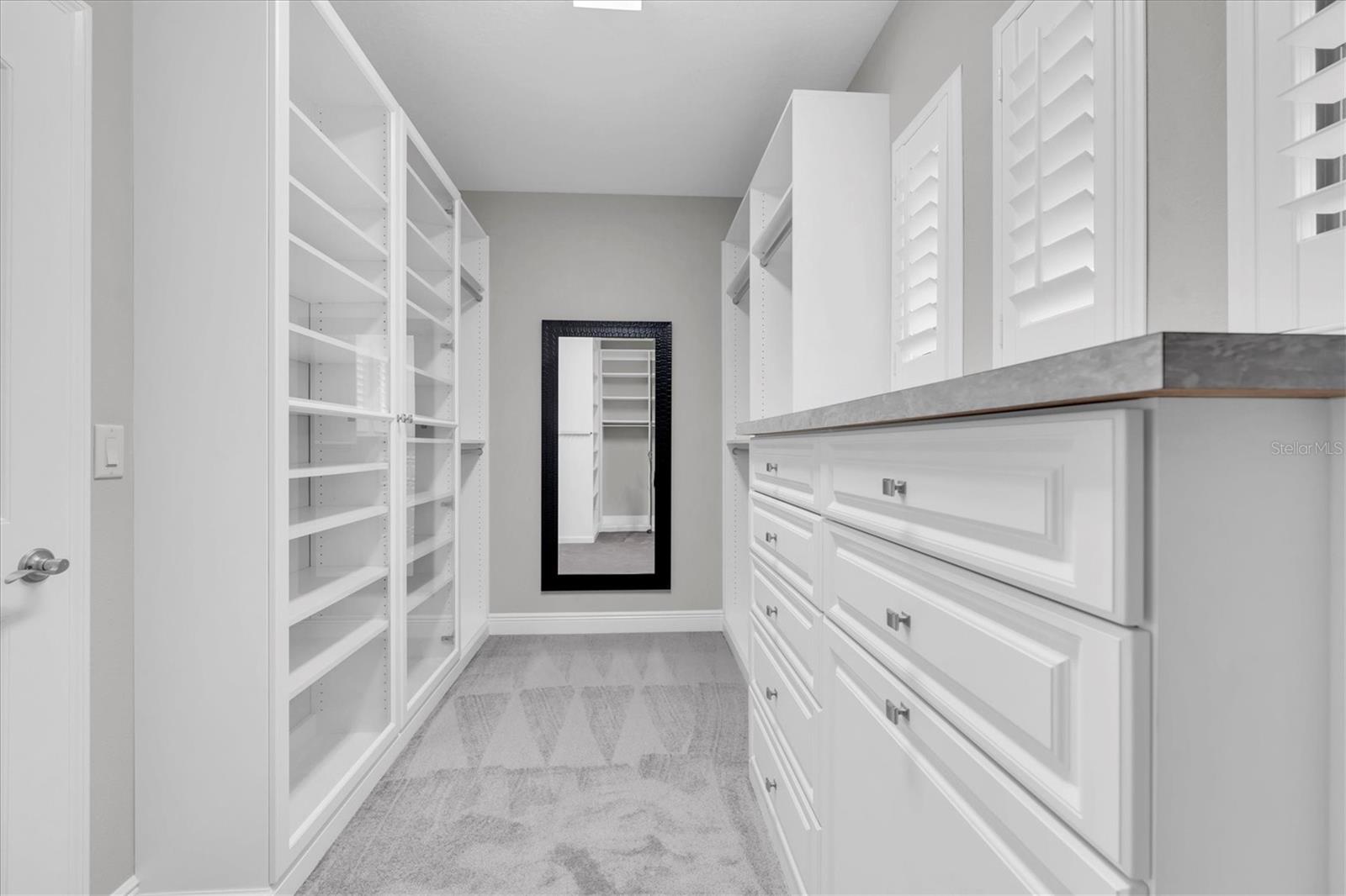 2 WALK IN CLOSETS WITH CUSTOM ORGANIZERS