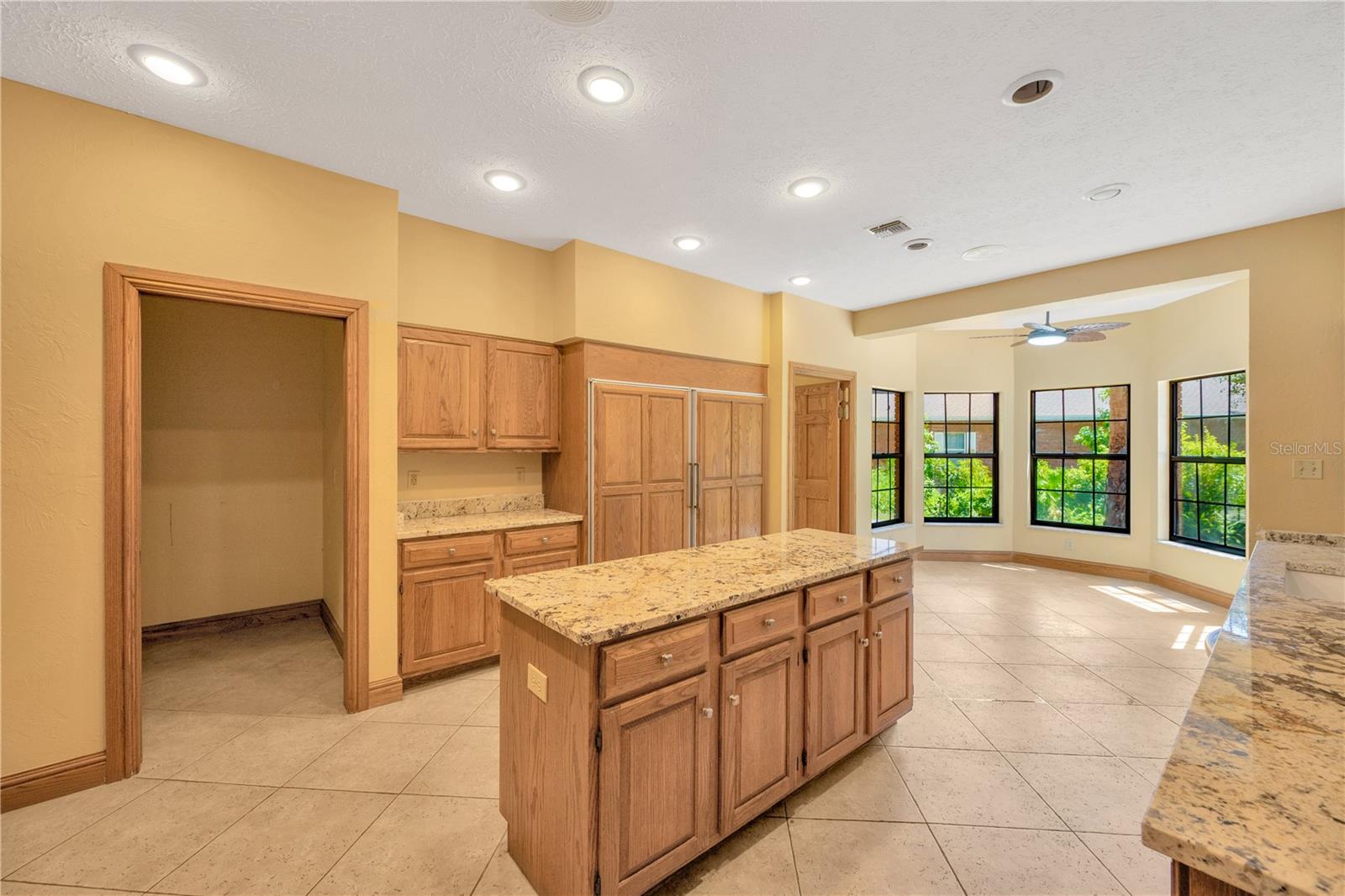 A walk-in pantry and additional prep area next to the refrigerator and freezer would make the perfect coffee nook.