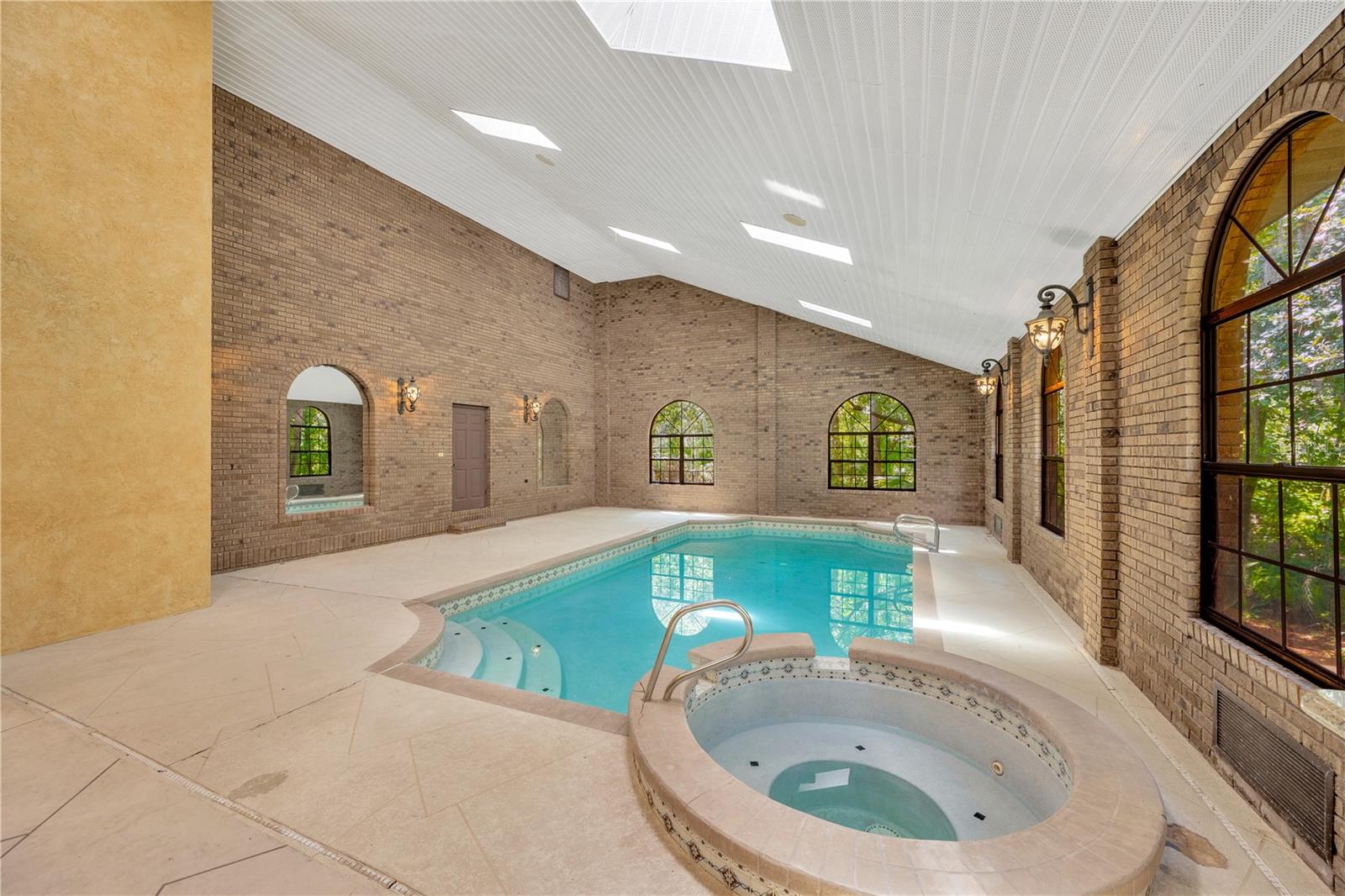 Indoor heated pool/spa atrium.