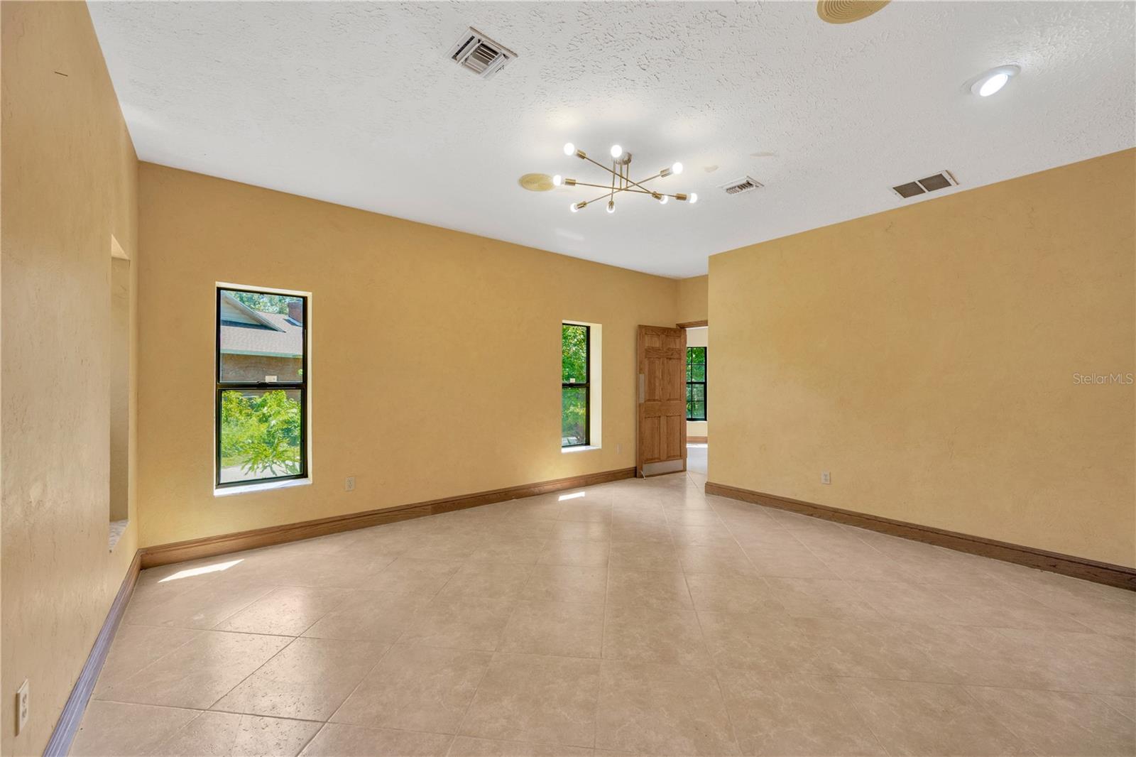 Dining room is adjacent the kitchen and accesible from the Foyer