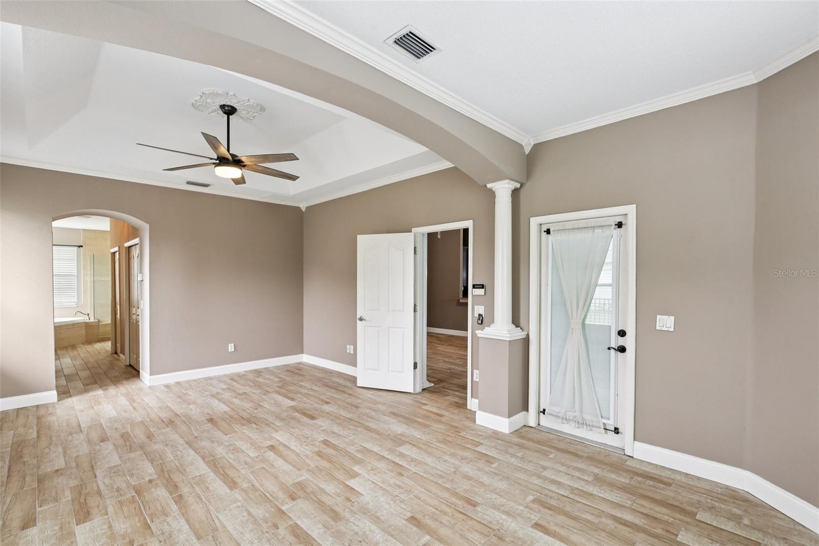 PRIMARY BEDROOM HAS ADDITIONAL SITTING ROOM SPACE AND PRIVATE DOOR TO THE POOL!!