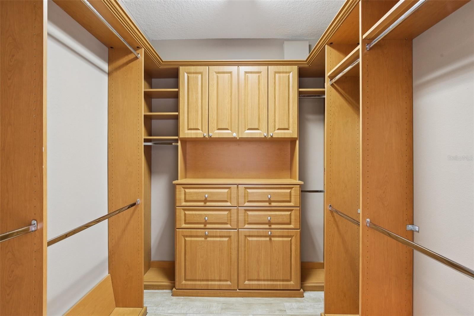 BEAUTIFULLY CRAFTED MASTER CLOSET BUILT-INS!