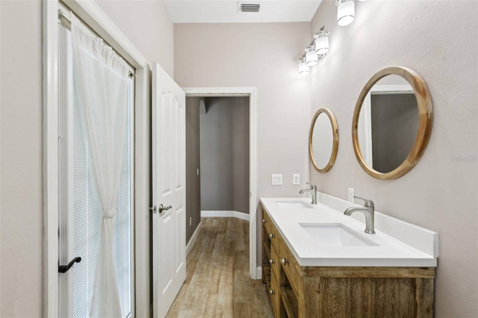 POOL BATH HAS DOUBLE SINK VANITY!