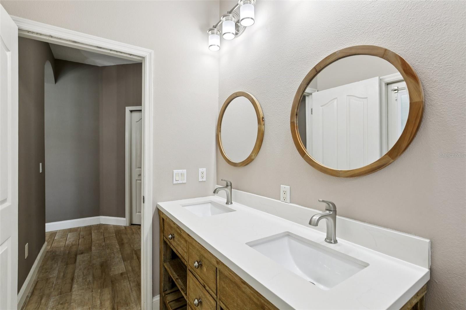POOL BATH HAS DOUBLE SINK VANITY!