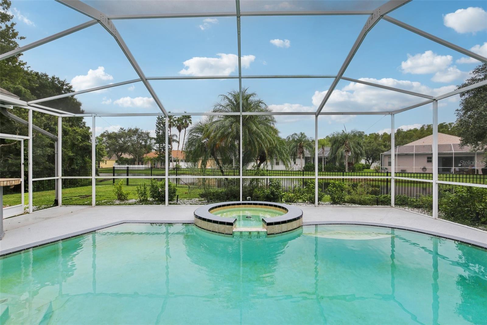 FLORIDA LIVING! POND VIEW WITH NO IMMEDIATE BACK YARD NEIGHBORS!