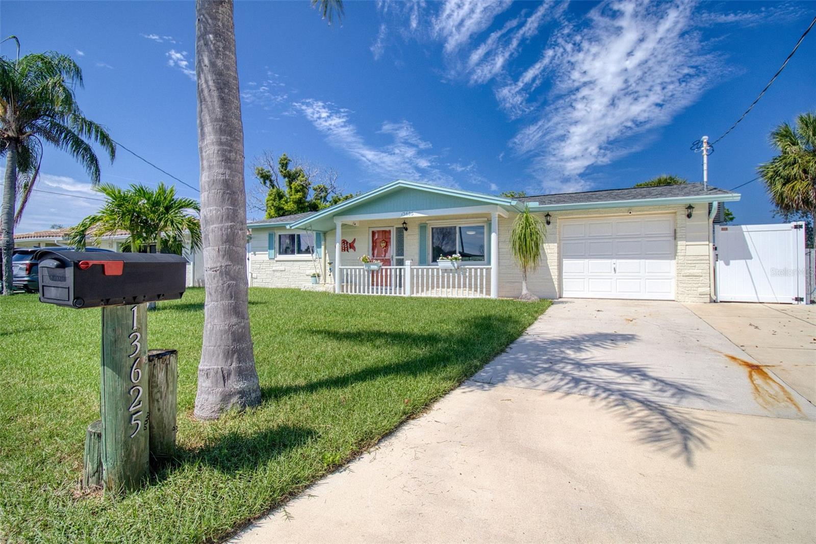 Front w/ large driveway