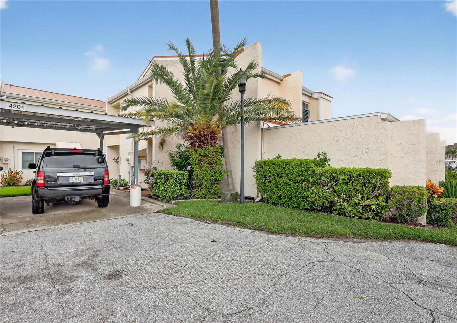 The carport is right outside your front door.