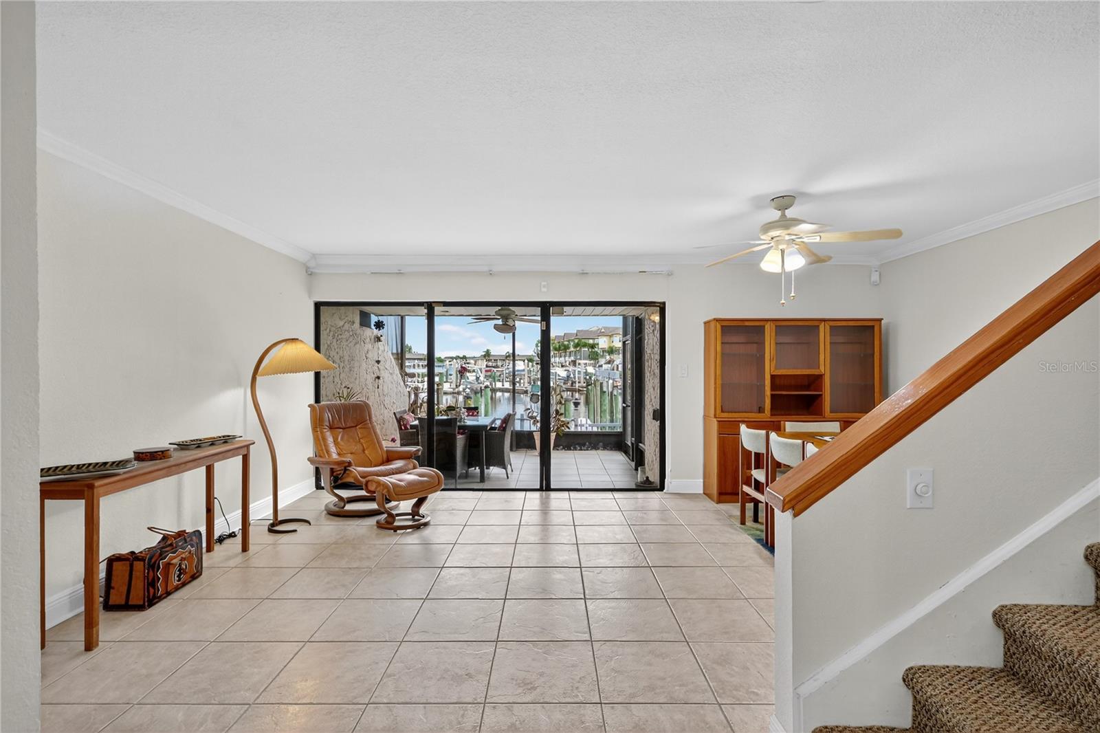 Condo opens onto a large living and dining area.